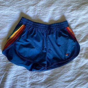 Aviator Nation Blue Athletic Shorts with Classic Rainbow Stripes